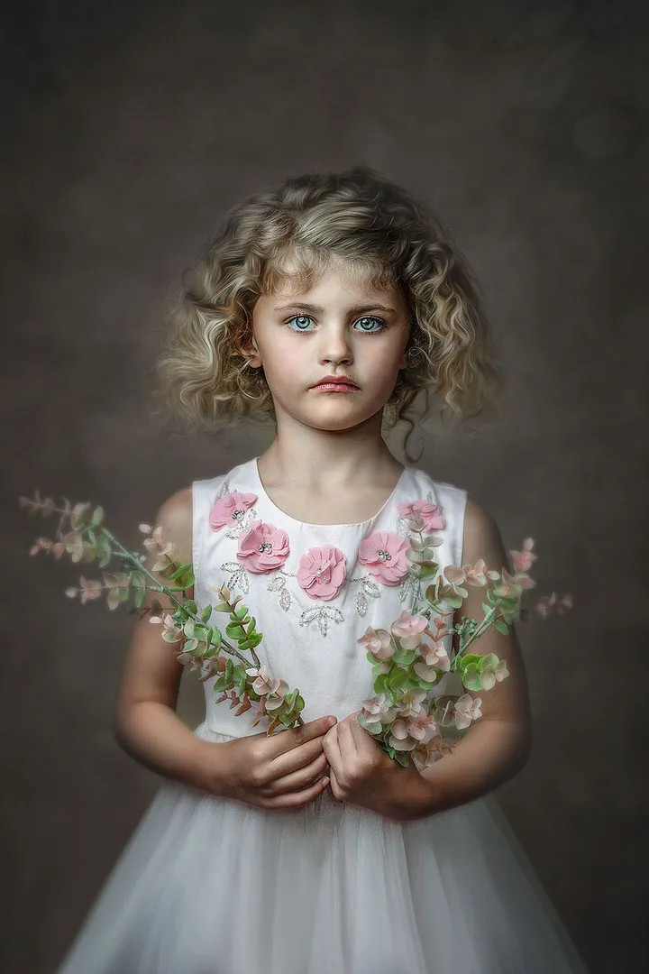 Fine art portrait — girl with flowers